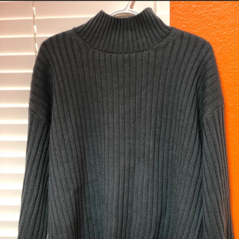 Distressed turtle neck sweater